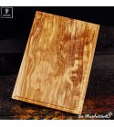 Large chopping board of olive wood with juice groove
